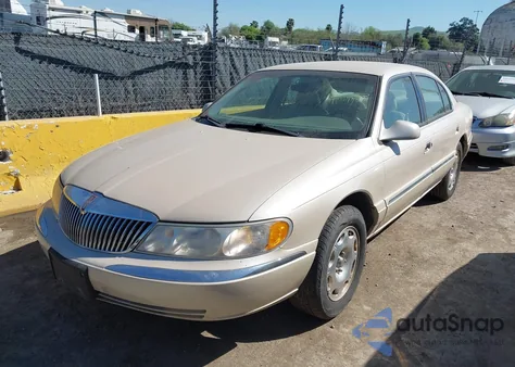 2001 Lincoln Continental z USA, uszkodzony, nr VIN 1LNHM97VX1Y634007
